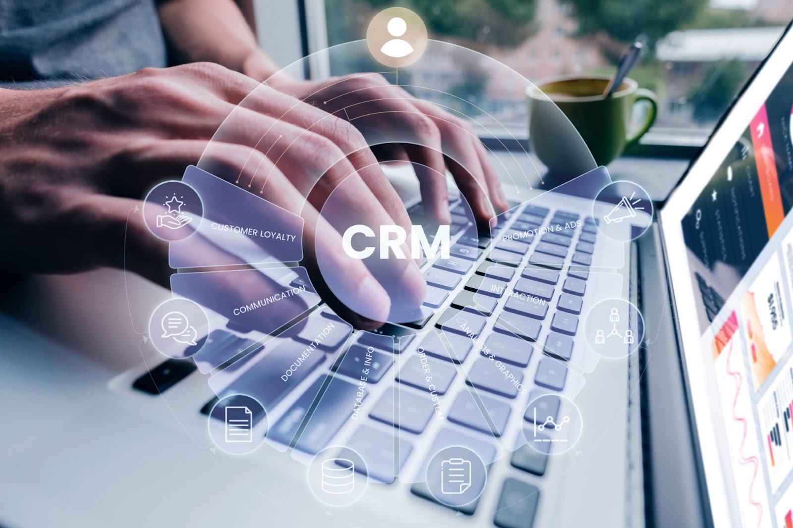 someone is typing on a laptop, there is an inscription on the screen CRM