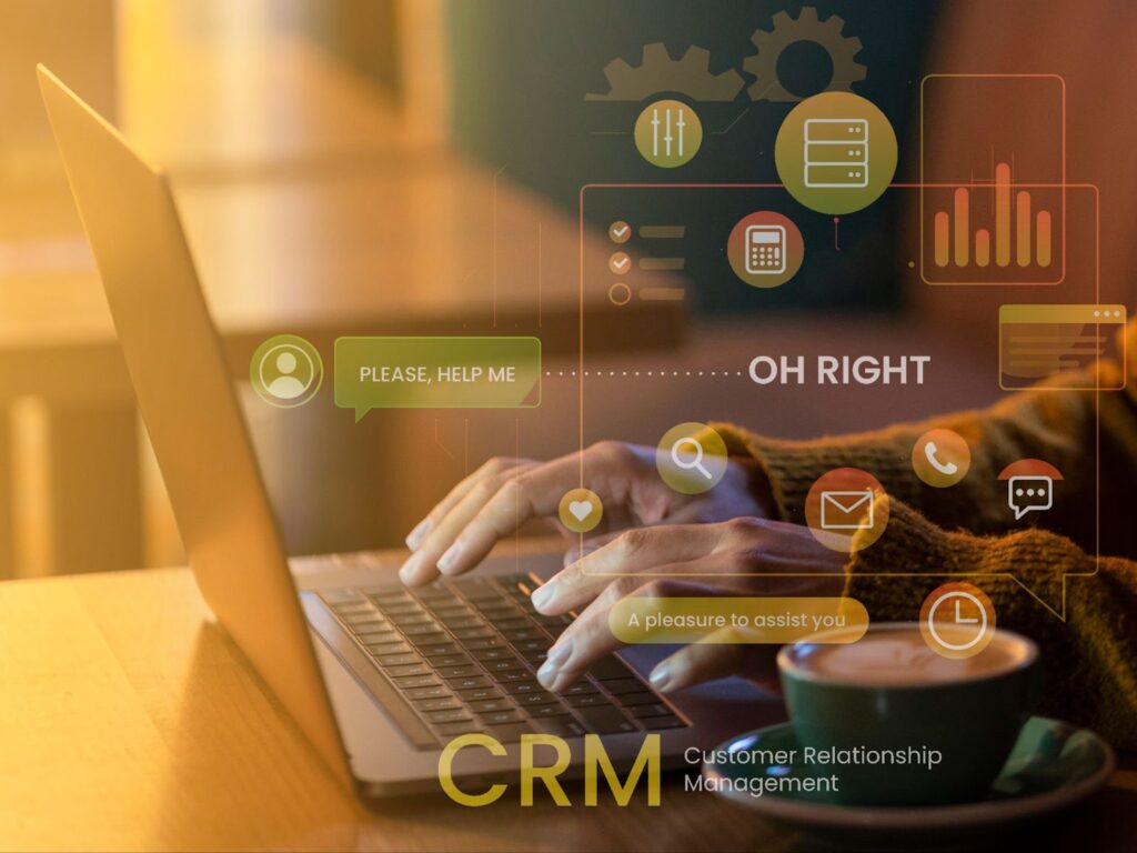 someone is typing on a laptop, there is an inscription on the screen CRM